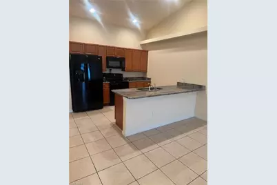 411 Nicholas Pkwy W, Cape Coral, FL 33991 - Photo 7