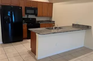 411 Nicholas Pkwy W, Cape Coral, FL 33991 - Photo 7