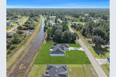 1025 Pilgrim St E, Lehigh Acres, FL 33974 - Photo 37