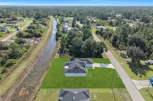 1025 Pilgrim St E, Lehigh Acres, FL 33974 - Photo 37