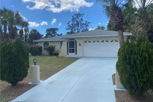 407 Plumosa Ave, Lehigh Acres, FL 33972 - Photo 1