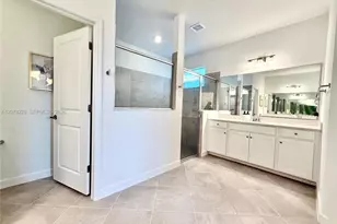9291 Aqua Overlook Ct, Lehigh Acres, FL 33936 - Photo 35