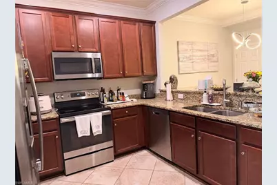 2703 Blossom Way, Naples, FL 34120 - Photo 3