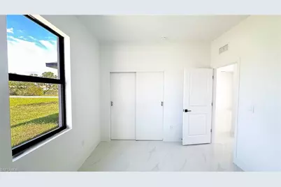 704 Asher St E, Lehigh Acres, FL 33974 - Photo 11