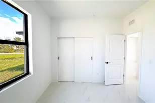 704 Asher St E, Lehigh Acres, FL 33974 - Photo 11