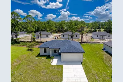 704 Asher St E, Lehigh Acres, FL 33974 - Photo 1