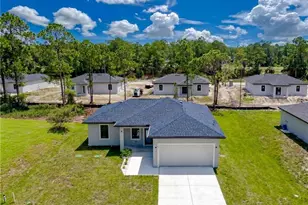 704 Asher St E, Lehigh Acres, FL 33974 - Photo 1