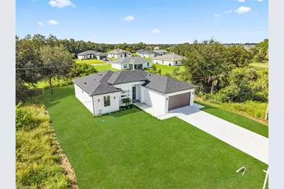 442 Redwing St SW, Lehigh Acres, FL 33974 - Photo 35