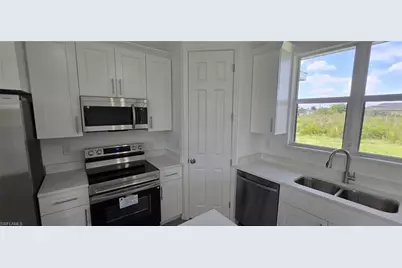 370 Chalet Ave S, Lehigh Acres, FL 33974 - Photo 11