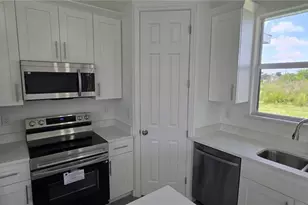 370 Chalet Ave S, Lehigh Acres, FL 33974 - Photo 11