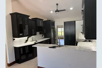 702 Calvin Ave, Lehigh Acres, FL 33972 - Photo 13