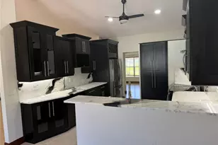 702 Calvin Ave, Lehigh Acres, FL 33972 - Photo 13