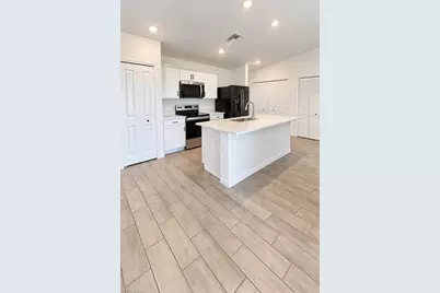 509 NW 25th Ter, Cape Coral, FL 33993 - Photo 5