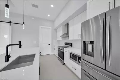 3308 10th St SW, Lehigh Acres, FL 33976 - Photo 13