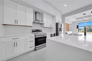 2706 30th St SW, Lehigh Acres, FL 33976 - Photo 13