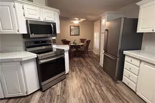 10561 Lake Loop Rd, North Fort Myers, FL 33903 - Photo 7