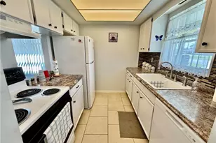2311 Narcissus Ct, Lehigh Acres, FL 33936 - Photo 13