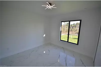 1242 Hathor St E, Lehigh Acres, FL 33974 - Photo 35