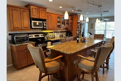 4417 Country Club Blvd #B8, Cape Coral, FL 33904 - Photo 3