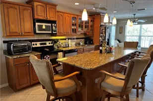 4417 Country Club Blvd, Cape Coral, FL 33904 - Photo 3