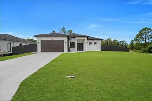 710 Almelia St E, Lehigh Acres, FL 33974 - Photo 1