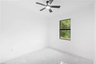 868 Carbon St E, Lehigh Acres, FL 33974 - Photo 21