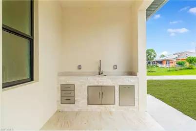 415 Chamonix Ave S, Lehigh Acres, FL 33974 - Photo 39