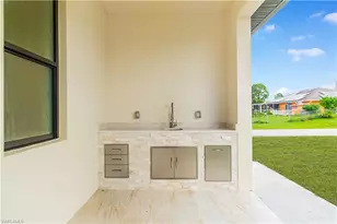 415 Chamonix Ave S, Lehigh Acres, FL 33974 - Photo 39