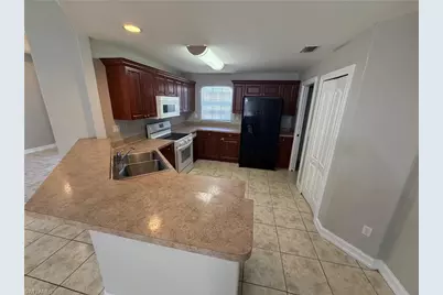 3211 8th St SW, Lehigh Acres, FL 33976 - Photo 13