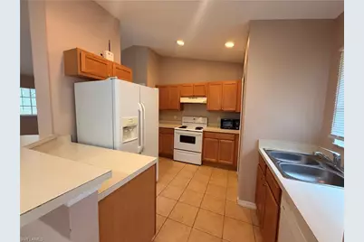 566 Nimitz Blvd, Lehigh Acres, FL 33974 - Photo 7