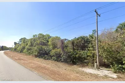 162 McArthur Blvd, Lehigh Acres, FL 33974 - Photo 1