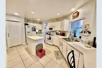 902 Susan Ave N, Lehigh Acres, FL 33971 - Photo 21