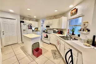 902 Susan Ave N, Lehigh Acres, FL 33971 - Photo 21