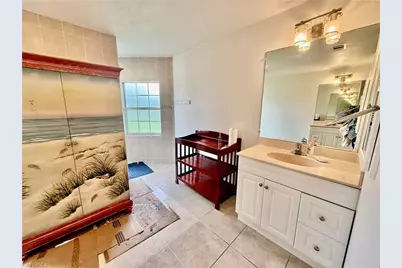 902 Susan Ave N, Lehigh Acres, FL 33971 - Photo 17