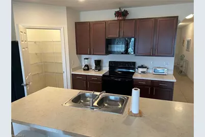 10531 Canal Brook Ln, Lehigh Acres, FL 33936 - Photo 11
