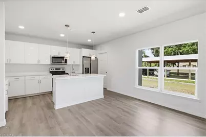 1406 Ford Cir, Lehigh Acres, FL 33936 - Photo 23