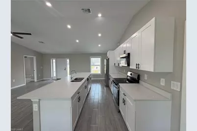 1410 NE Juanita Pl, Cape Coral, FL 33909 - Photo 11