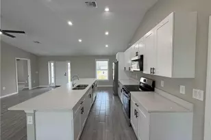 1410 NE Juanita Pl, Cape Coral, FL 33909 - Photo 11