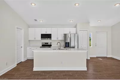 2219 NW 25th Ter, Cape Coral, FL 33993 - Photo 9