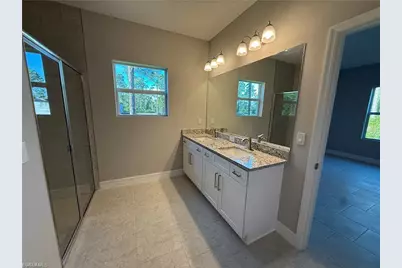 279 Woodburn Dr, Lehigh Acres, FL 33972 - Photo 9