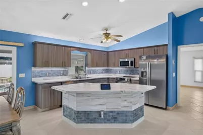 240 SE 28th Ter, Cape Coral, FL 33904 - Photo 7