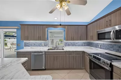 240 SE 28th Ter, Cape Coral, FL 33904 - Photo 9