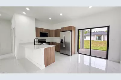 708 Asher St E, Lehigh Acres, FL 33974 - Photo 3