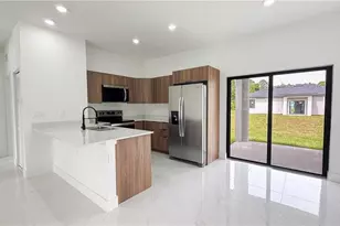 712 Asher St E, Lehigh Acres, FL 33974 - Photo 3