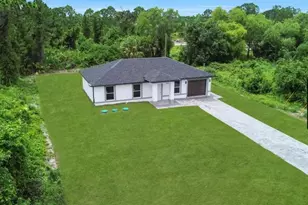 382 McArthur Blvd, Lehigh Acres, FL 33974 - Photo 1