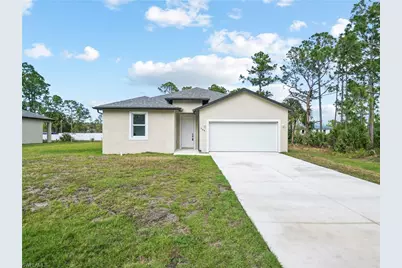 566 Woodview Dr, Lehigh Acres, FL 33972 - Photo 1