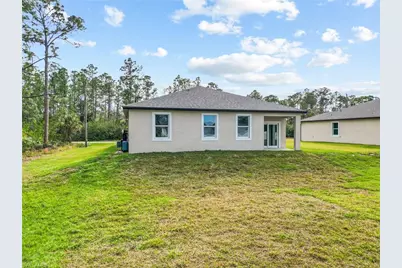 566 Woodview Dr, Lehigh Acres, FL 33972 - Photo 25