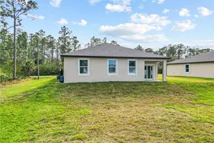 566 Woodview Dr, Lehigh Acres, FL 33972 - Photo 25