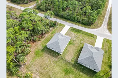 566 Woodview Dr, Lehigh Acres, FL 33972 - Photo 27