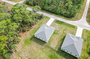 566 Woodview Dr, Lehigh Acres, FL 33972 - Photo 27